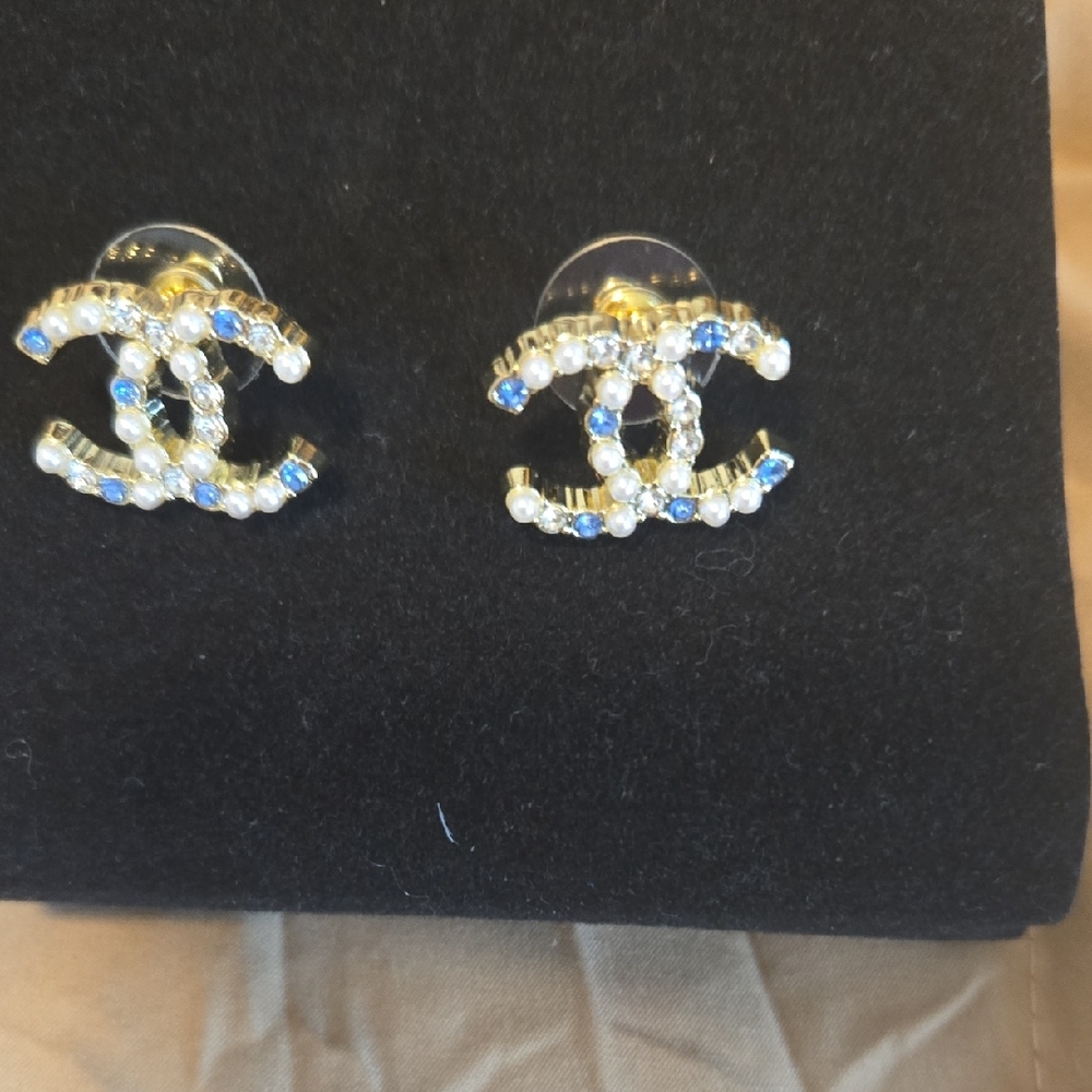 CHANEL Gold and White Earrings with Blue Accents